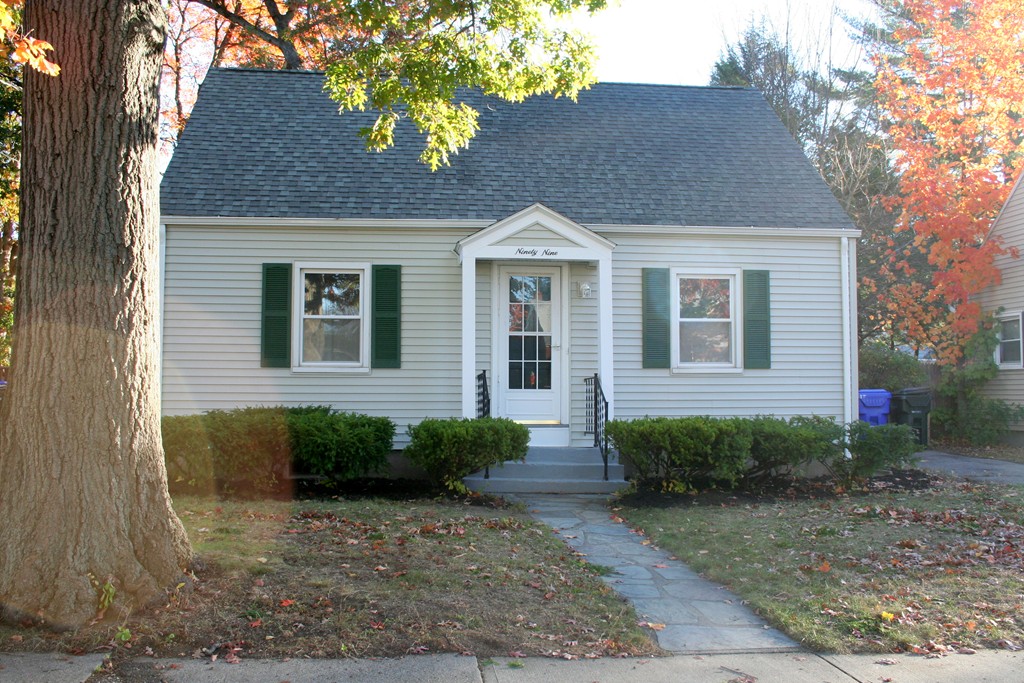 99 Eddy Street Springfield, MA 01104 - Photo 1 of 13 a front view of a house with garden