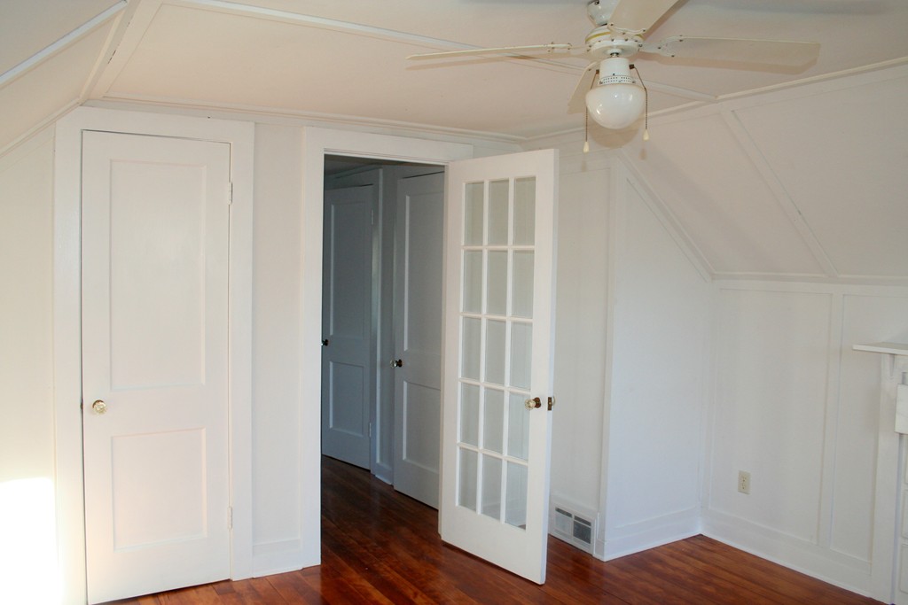 99 Eddy Street Springfield, MA 01104 - Photo 13 of 13 a view of a hallway with wooden floor
