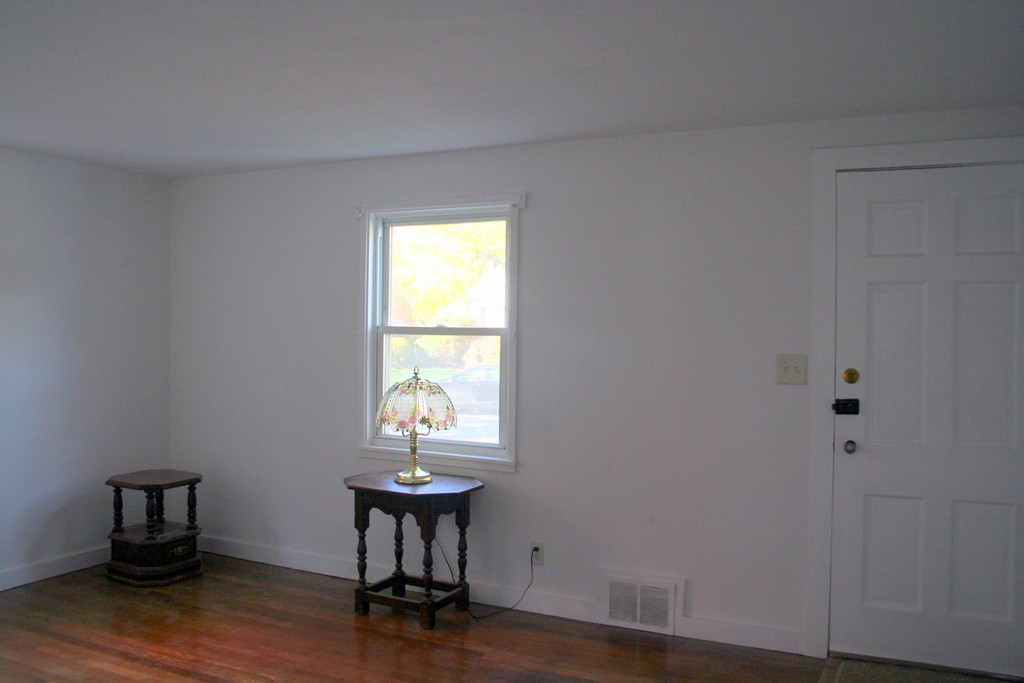 99 Eddy Street Springfield, MA 01104 - Photo 3 of 13 a room with a table and a window