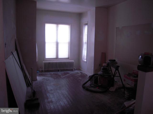 507 K Street Northeast Washington, DC 20002 - Photo 3 of 9 a room with hard wood floor and a window