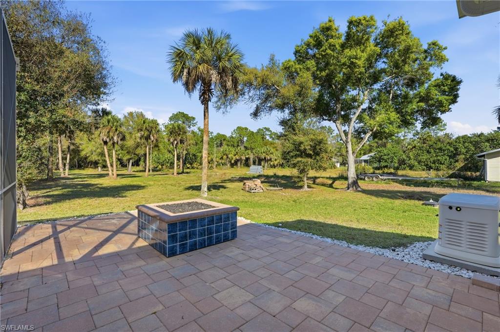 3707 5th Avenue Southwest Naples, FL 34117 - Photo 38 of 45 Relax by your gas burning firepit