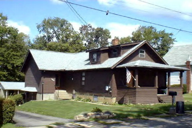 303 Chestnut Street Rimersburg, PA 16248 - Photo 1 of 1 a front view of a house with garden