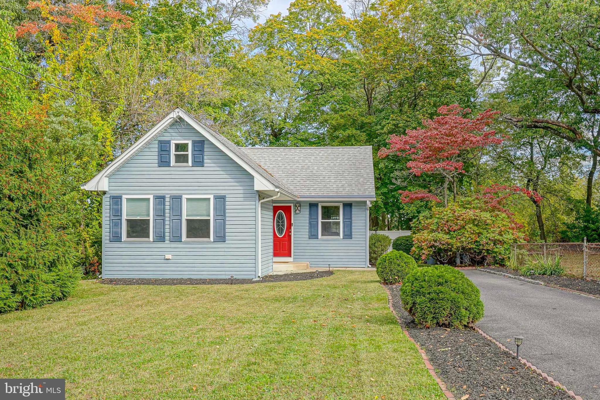 407 Hamilton Road Glassboro, NJ 08028 - Photo 1 of 31 a front view of a house with a yard