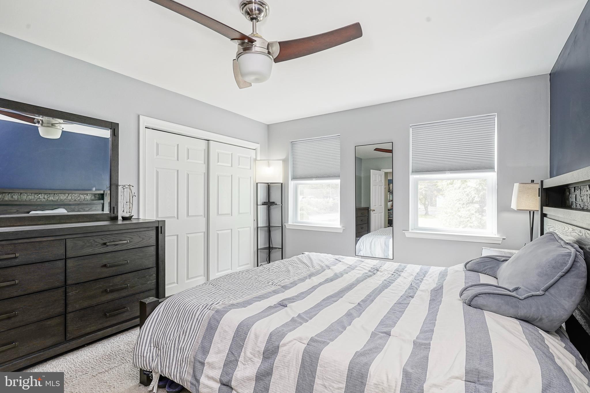 407 Hamilton Road Glassboro, NJ 08028 - Photo 13 of 31 a bedroom with a bed and a dresser