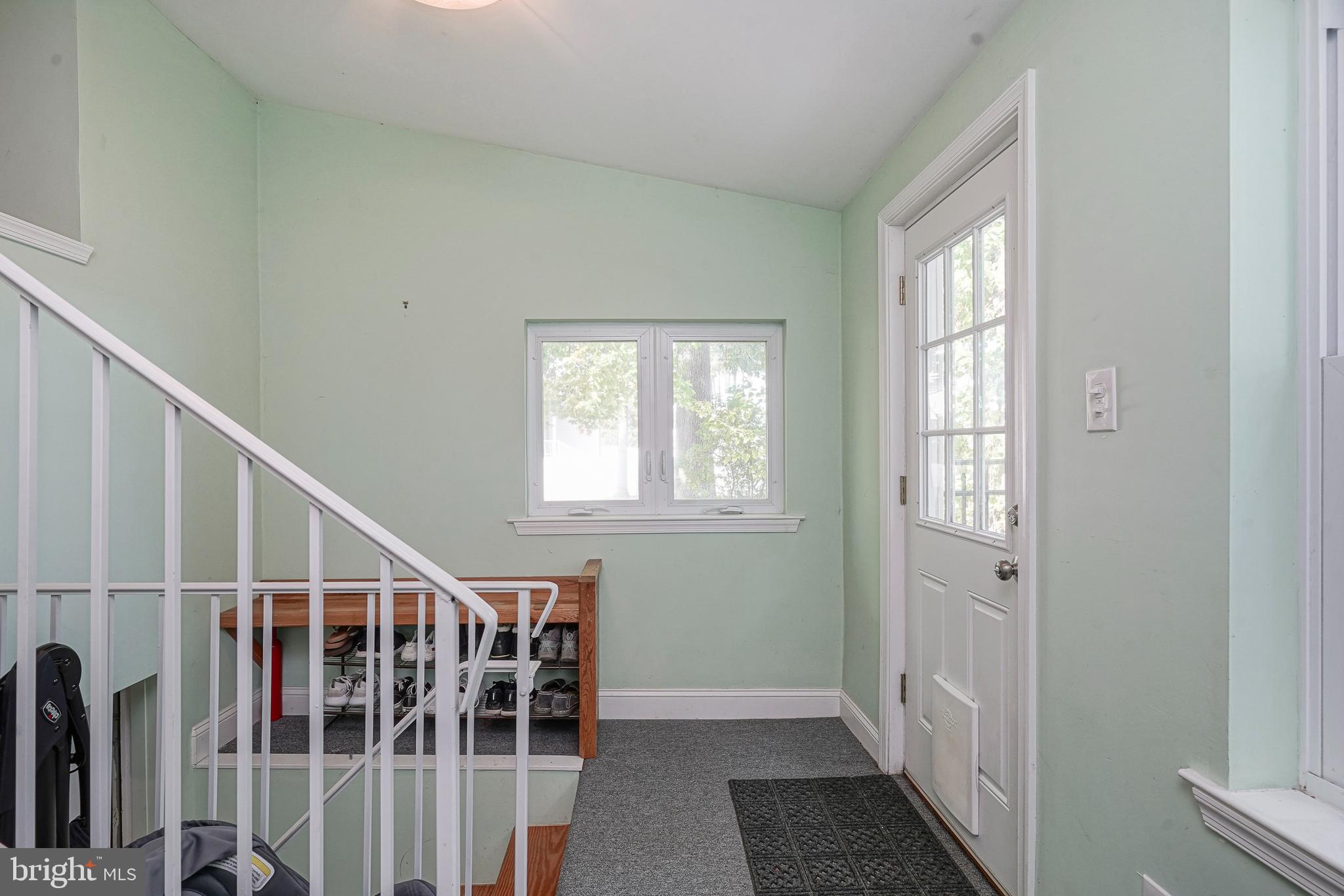 407 Hamilton Road Glassboro, NJ 08028 - Photo 23 of 31 a view of entryway with wooden floor and stairs