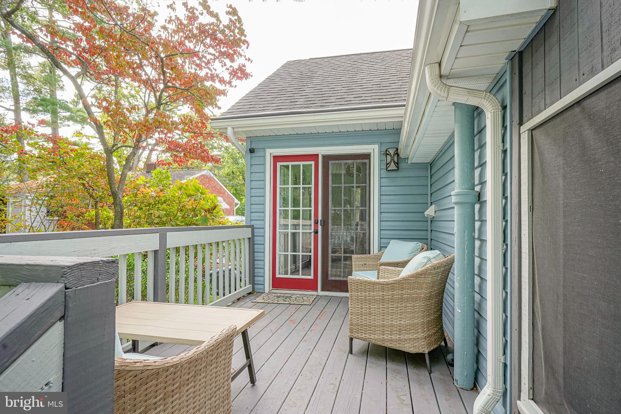 407 Hamilton Road Glassboro, NJ 08028 - Photo 26 of 31 a view of a wooden deck with a bench