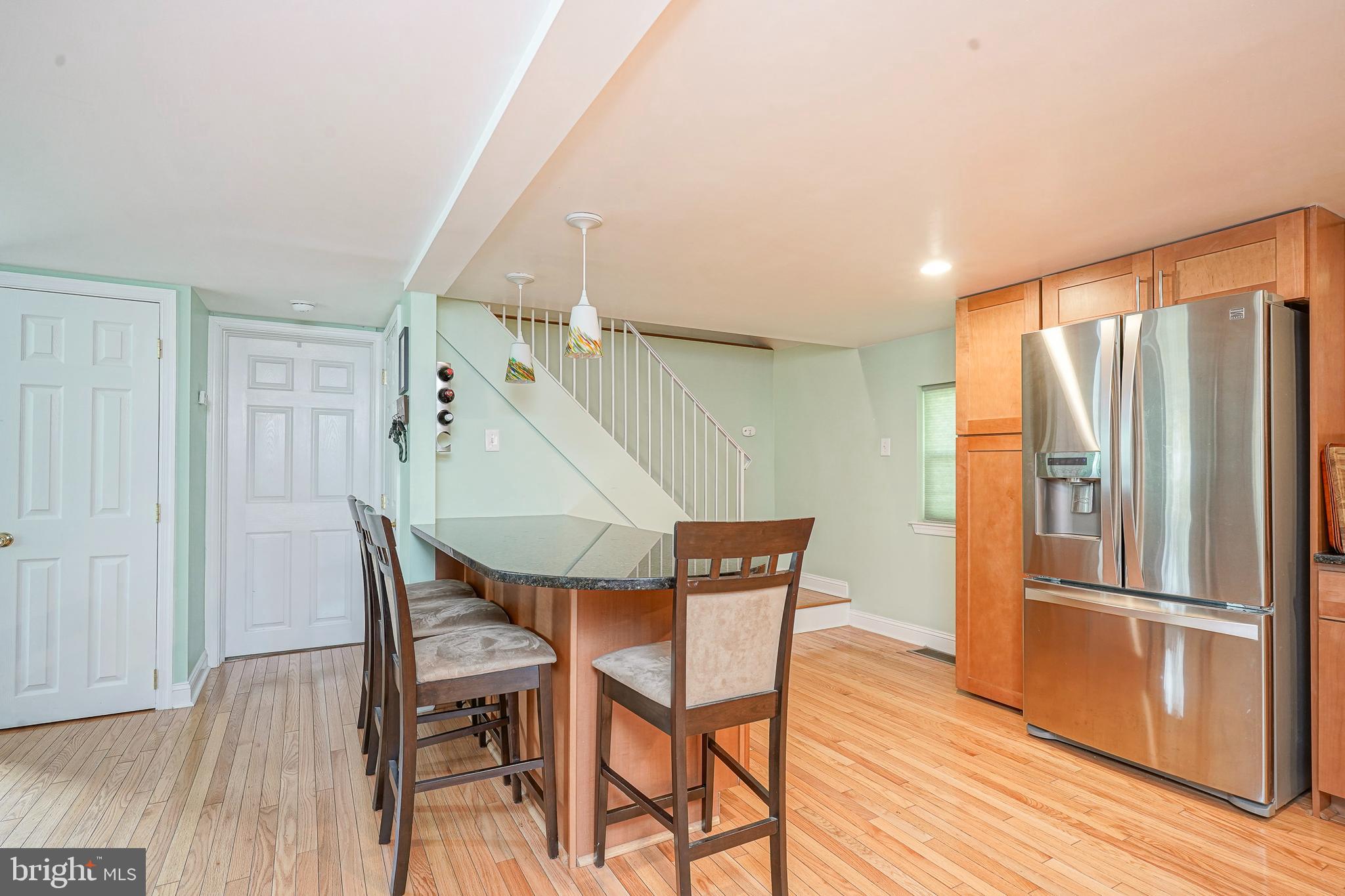 407 Hamilton Road Glassboro, NJ 08028 - Photo 6 of 31 a dining room with furniture and wooden floor