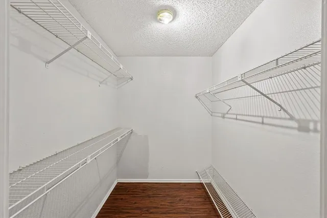 a view of a room with racks on the wall