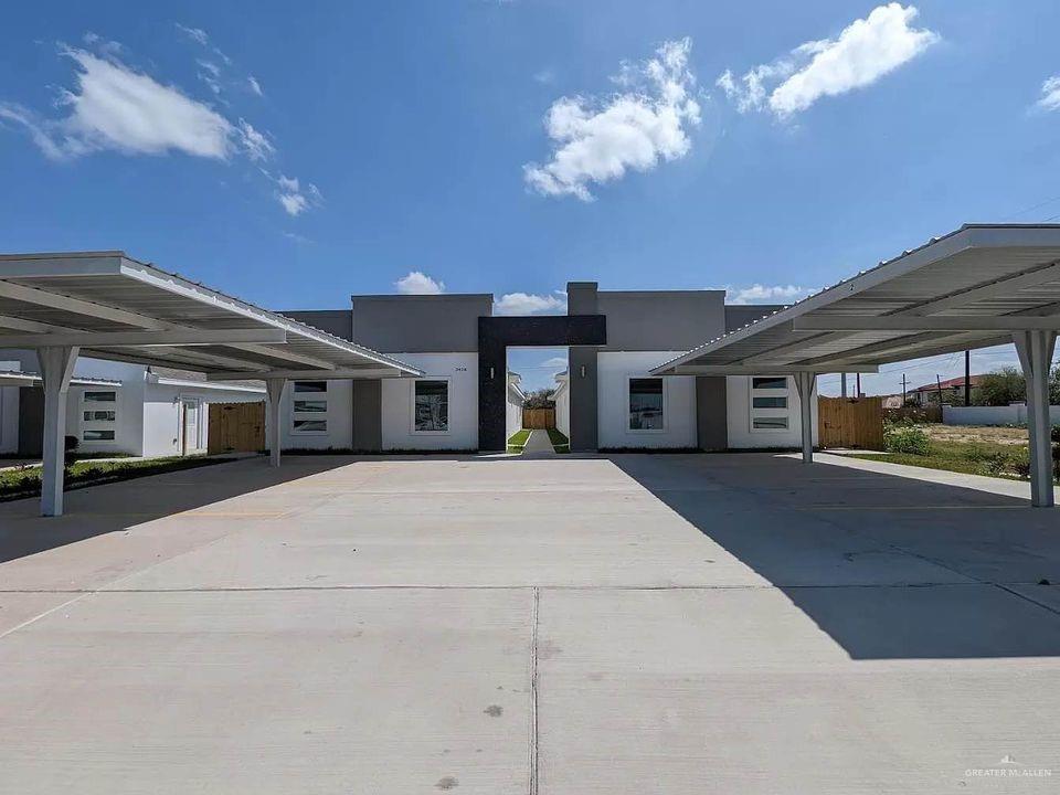 3408 South Colt Lane, Unit 3 Edinburg, TX 78539 - Photo 1 of 1 a front view of a house with a yard