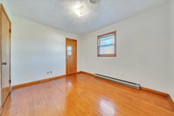 an empty room with window