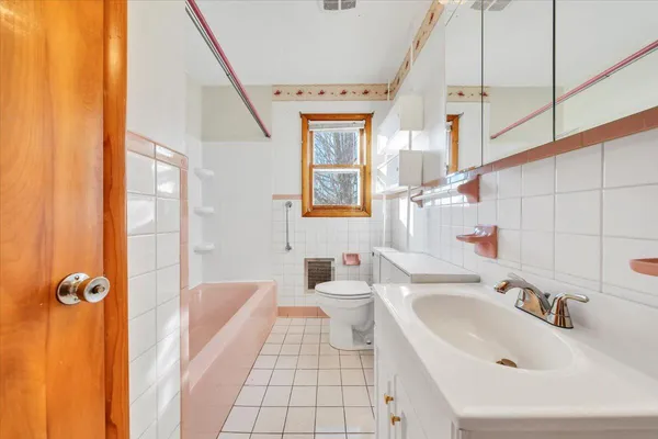 a bathroom with a sink and a bathtub
