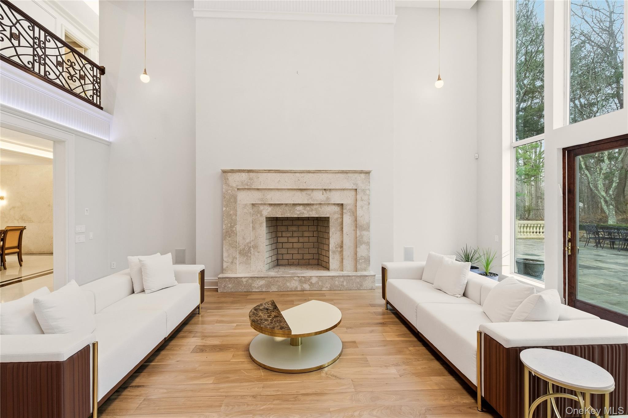 55 Coves Run Syosset, NY 11791 - Photo 6 of 50 a living room with furniture and a fireplace