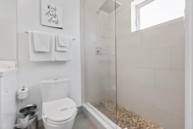 a room with a bed and a window