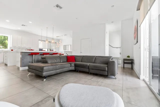 a bathroom with a sink and mirror