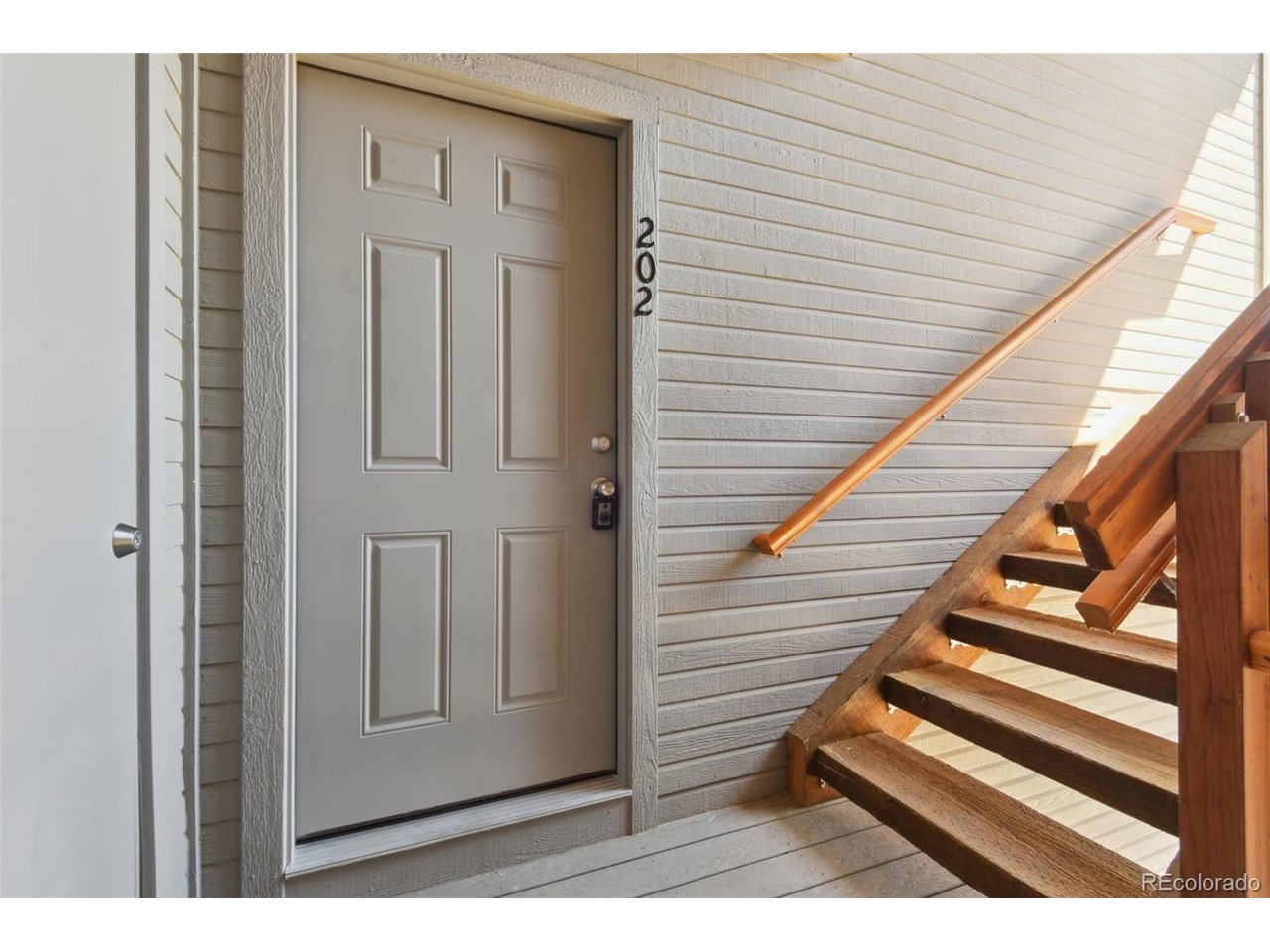 8457 South Reed Street, Unit 202 Littleton, CO 80128 - Photo 4 of 17 exterior front door
