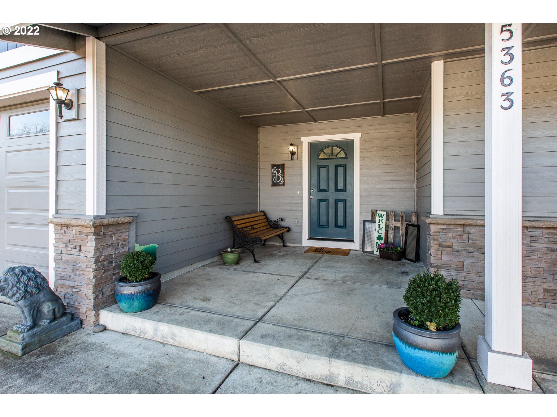 5363 I Street Springfield, OR 97478 - Photo 5 of 29 a view of a patio with chair and potted plant