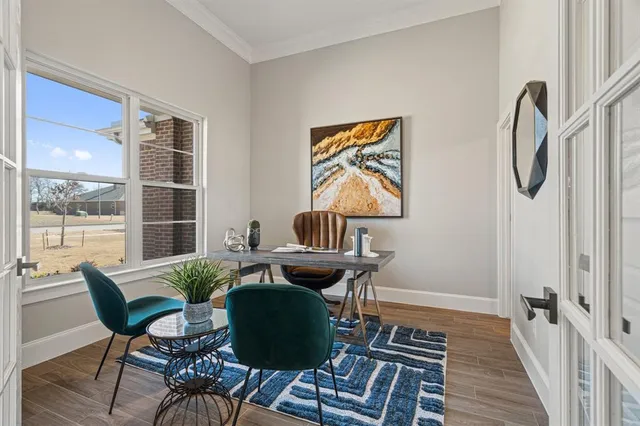 a living room with furniture and a table