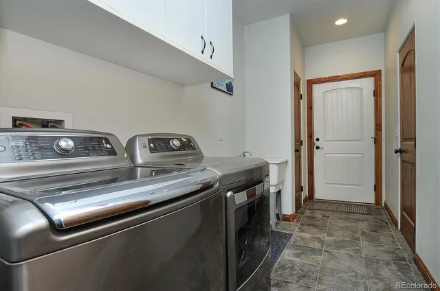 a utility room with washer and dryer