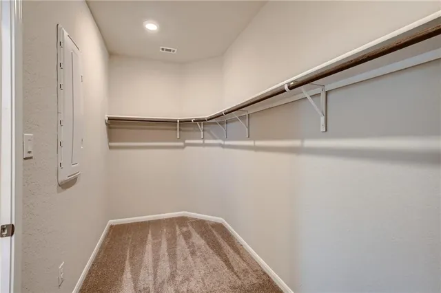 a view of a room with racks on the wall