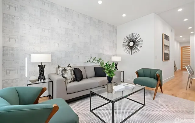 a dining room with furniture and wooden floor