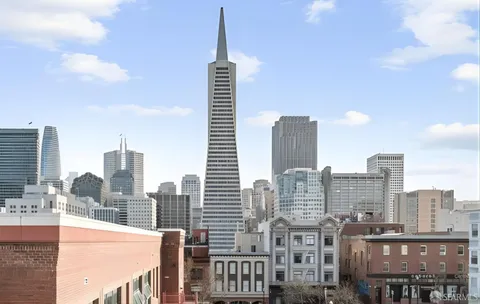 a view of a city with tall buildings