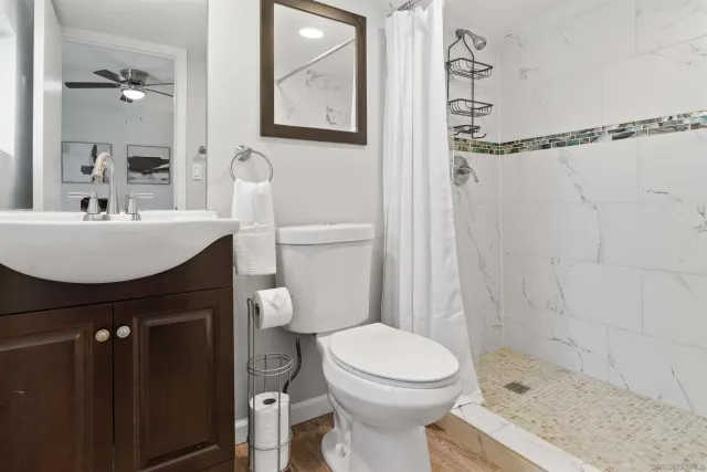 a bedroom with bed and window