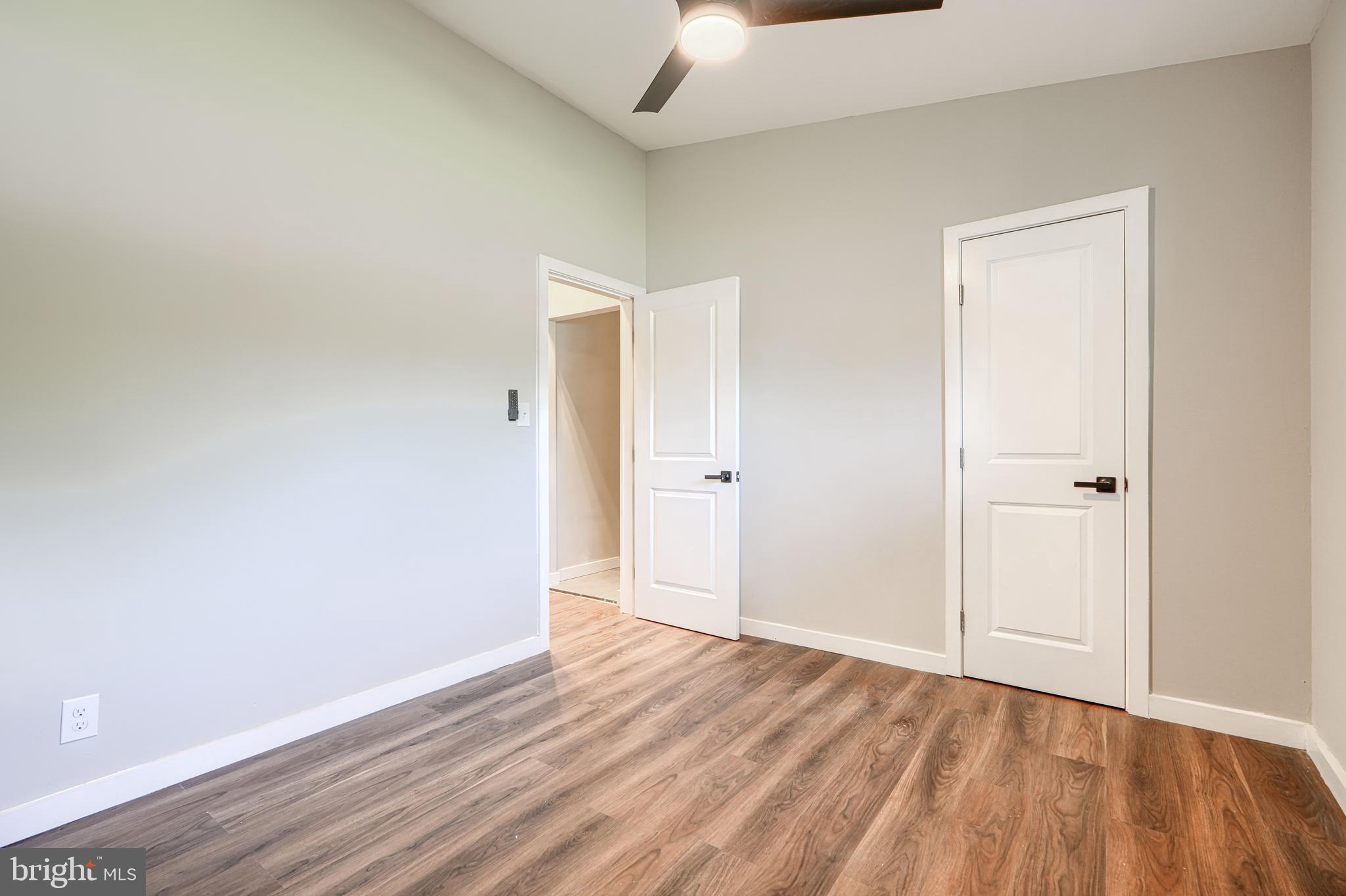 6200 Ivymount Road Baltimore, MD 21209 - Photo 30 of 71 a view of an empty room and wooden floor