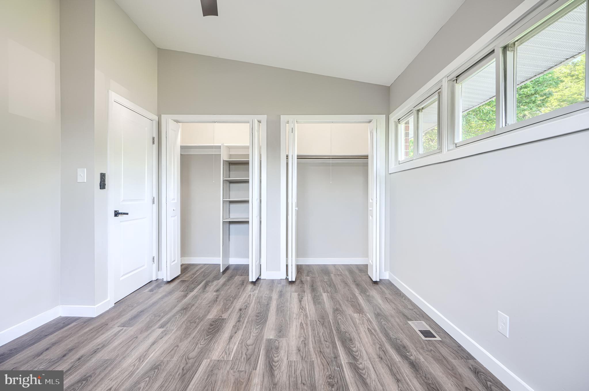 6200 Ivymount Road Baltimore, MD 21209 - Photo 37 of 71 wooden floor in an empty room with a window