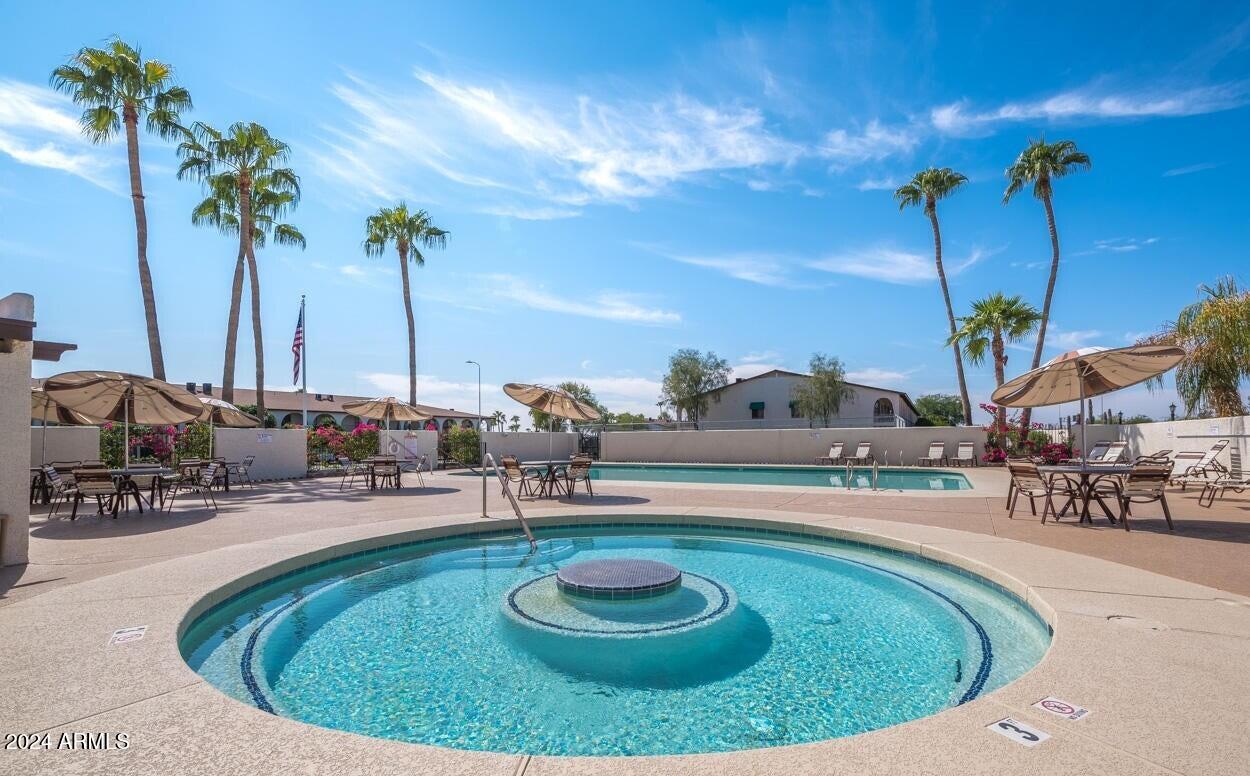 3270 South Goldfield Road, Unit 514 Apache Junction, AZ 85119 - Photo 29 of 56 Pool area 3 ft