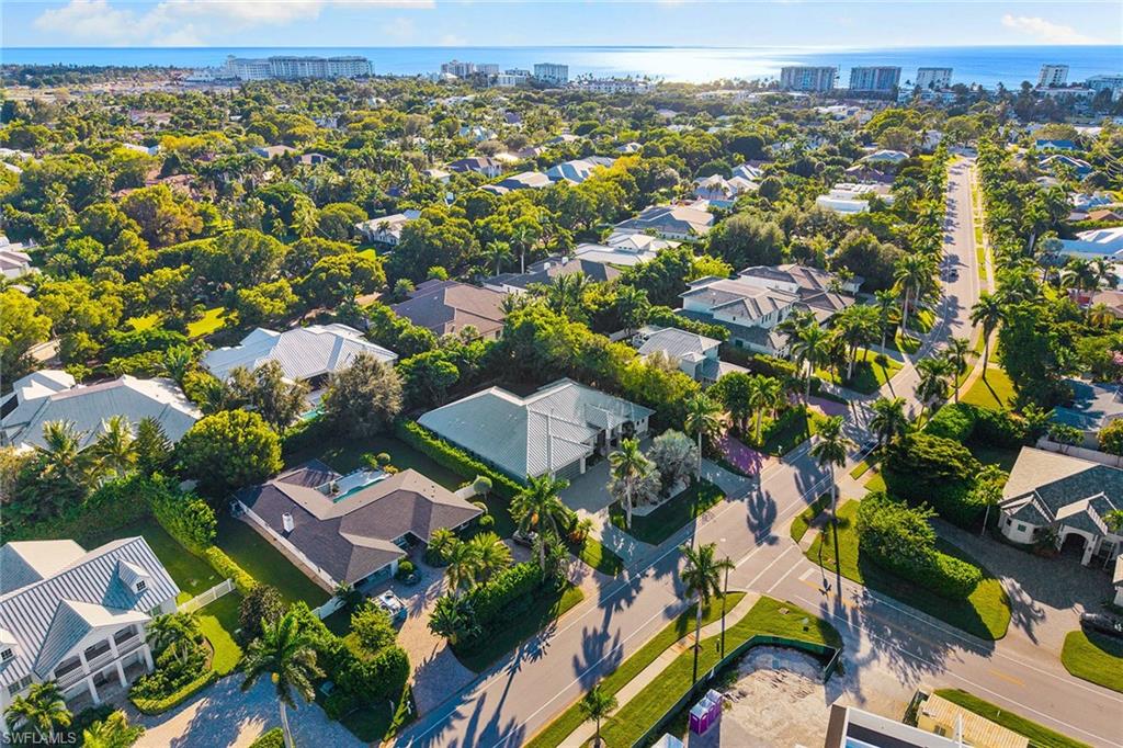 720 Orchid Drive Naples, FL 34102 - Photo 50 of 50 an aerial view of residential houses with outdoor space