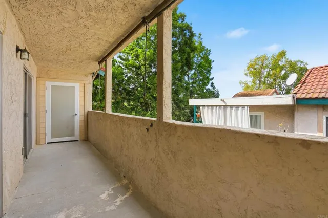 a view of a house with a balcony