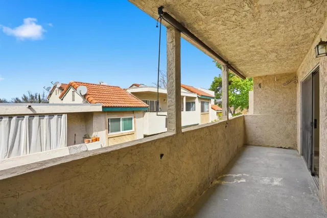 a view of a porch of a house
