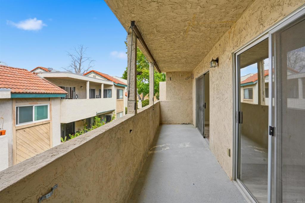 3435 Capalina Road, Unit 10 San Marcos, CA 92069 - Photo 20 of 34 a view of a house with a balcony
