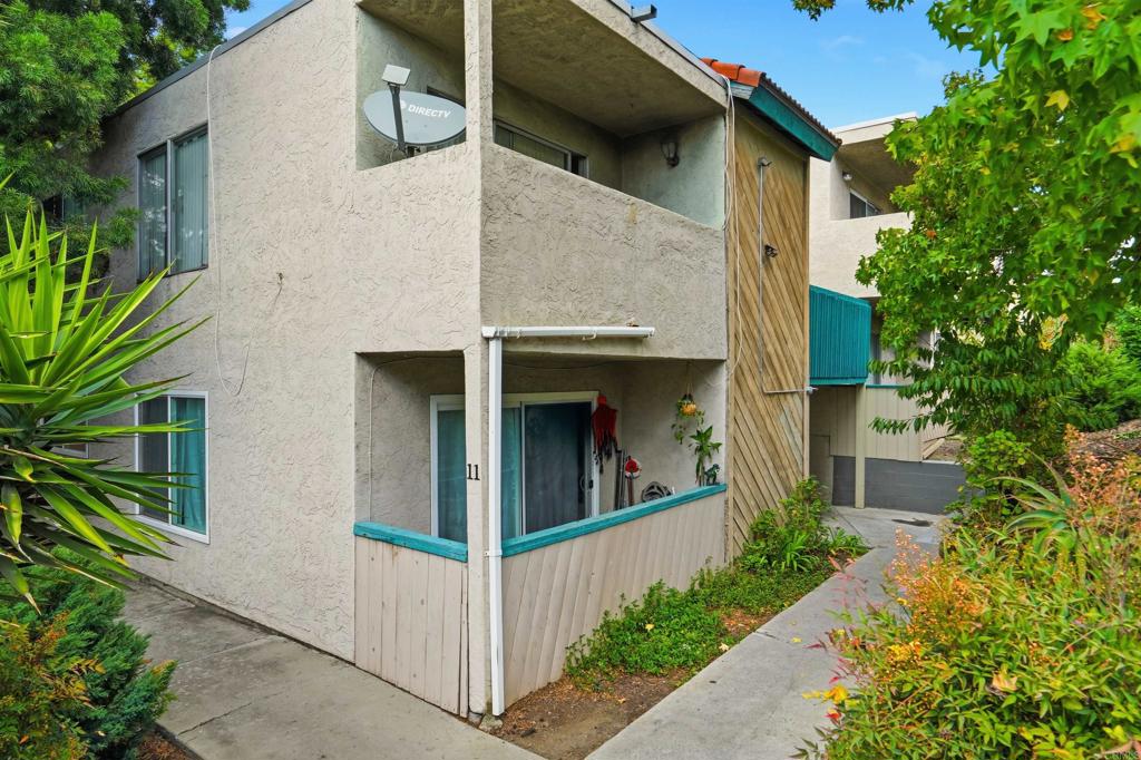3435 Capalina Road, Unit 10 San Marcos, CA 92069 - Photo 24 of 34 a view of a house with garage