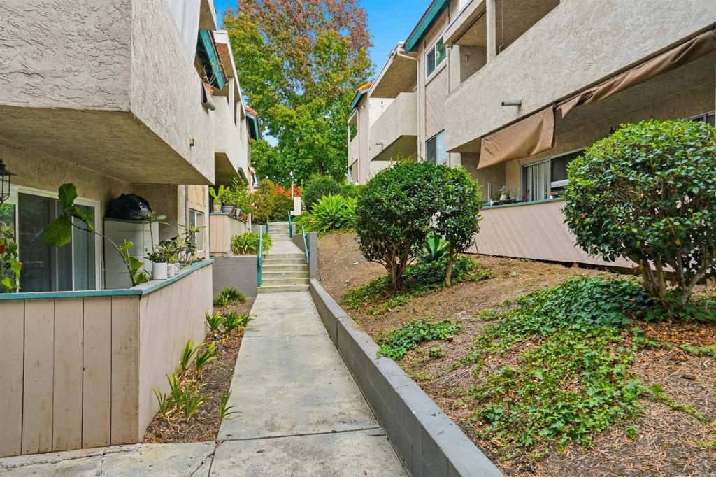 3435 Capalina Road, Unit 10 San Marcos, CA 92069 - Photo 26 of 34 a view of a house with backyard