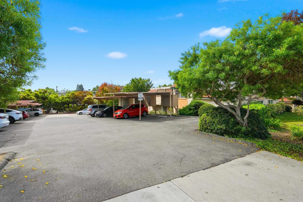 3435 Capalina Road, Unit 10 San Marcos, CA 92069 - Photo 29 of 34 a car parked on the side of the road