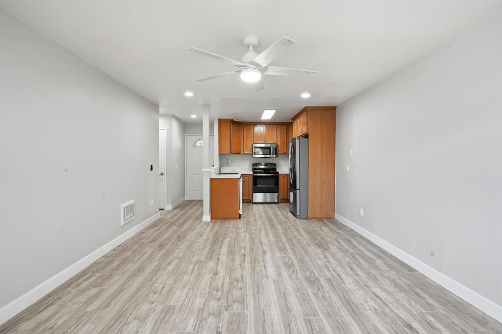 3435 Capalina Road, Unit 10 San Marcos, CA 92069 - Photo 6 of 34 a view of kitchen with wooden floor