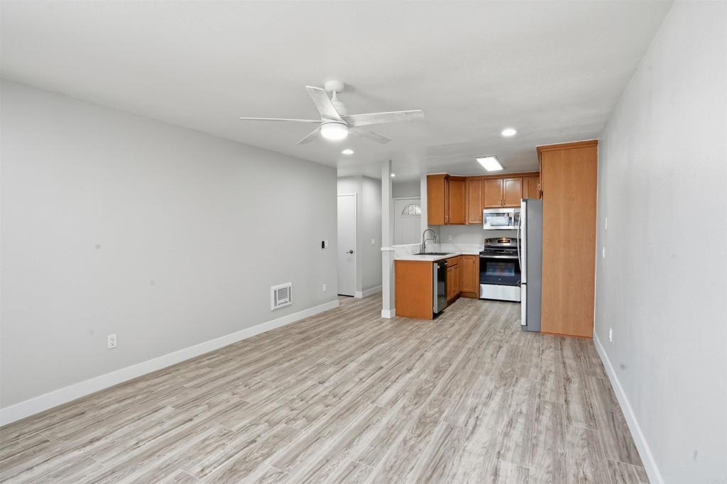 3435 Capalina Road, Unit 10 San Marcos, CA 92069 - Photo 7 of 34 a view of kitchen with wooden floor