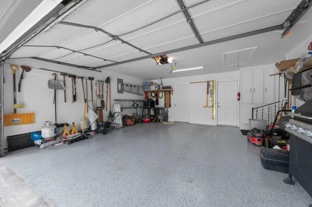 a view of a storage area with shoes and chairs