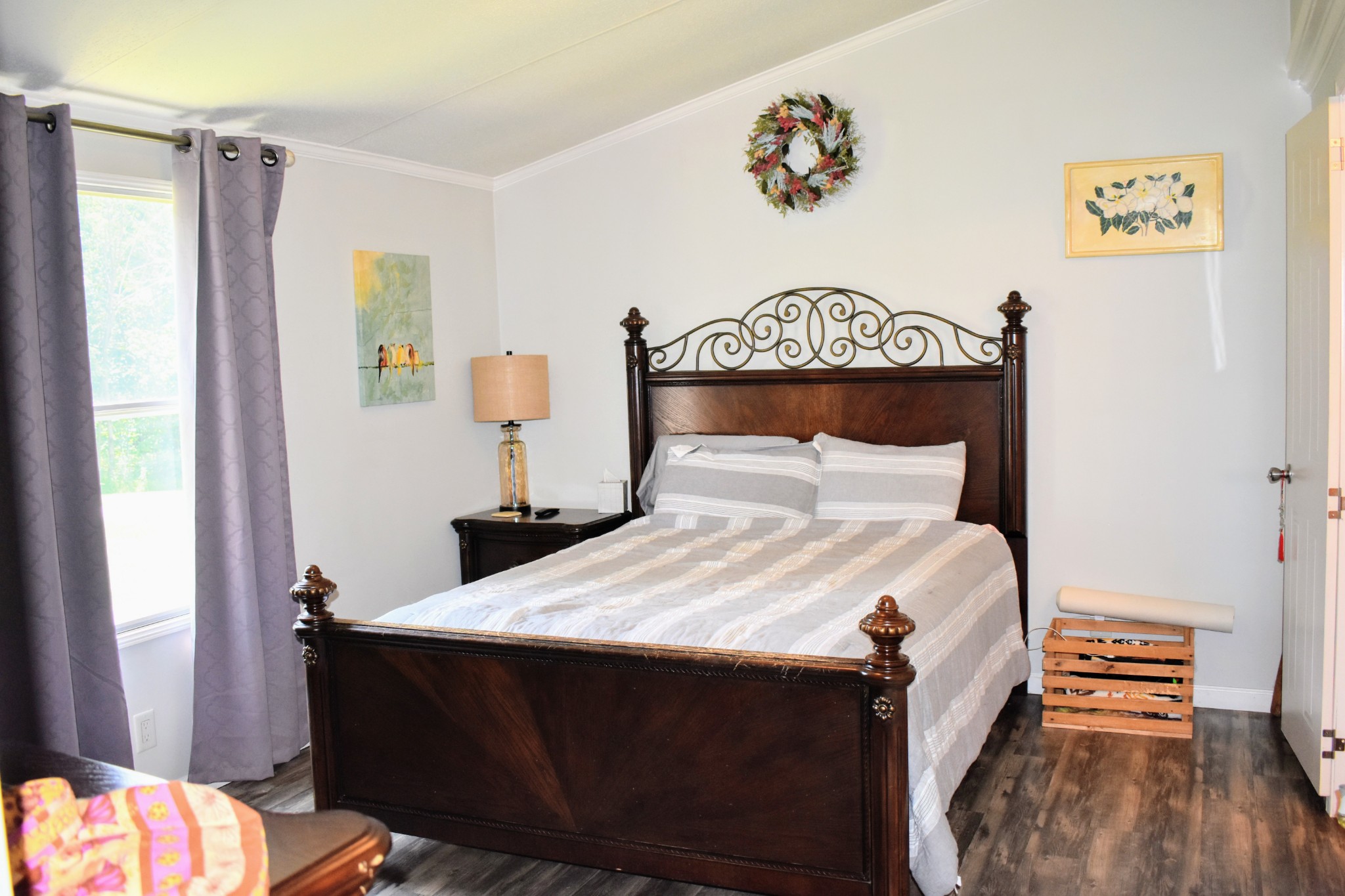 2630 Jernigans Branch Road Beechgrove, TN 37018 - Photo 12 of 17 a bedroom with a bed and wooden floor