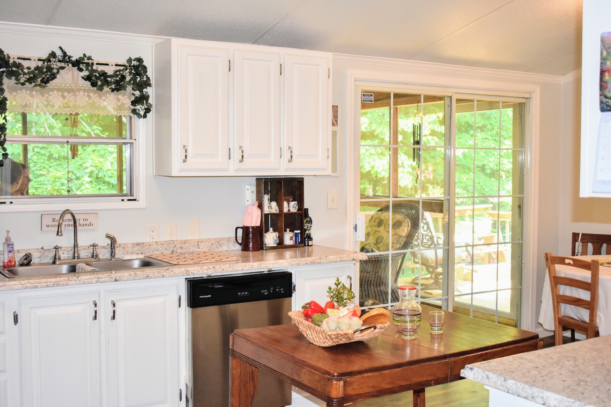 2630 Jernigans Branch Road Beechgrove, TN 37018 - Photo 8 of 17 a kitchen with a sink cabinets and window