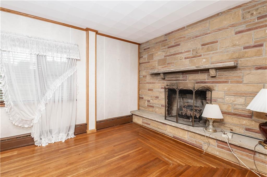 845 Grisemore Road Clymer, PA 15728 - Photo 13 of 21 a view of a room with wooden floor and furniture