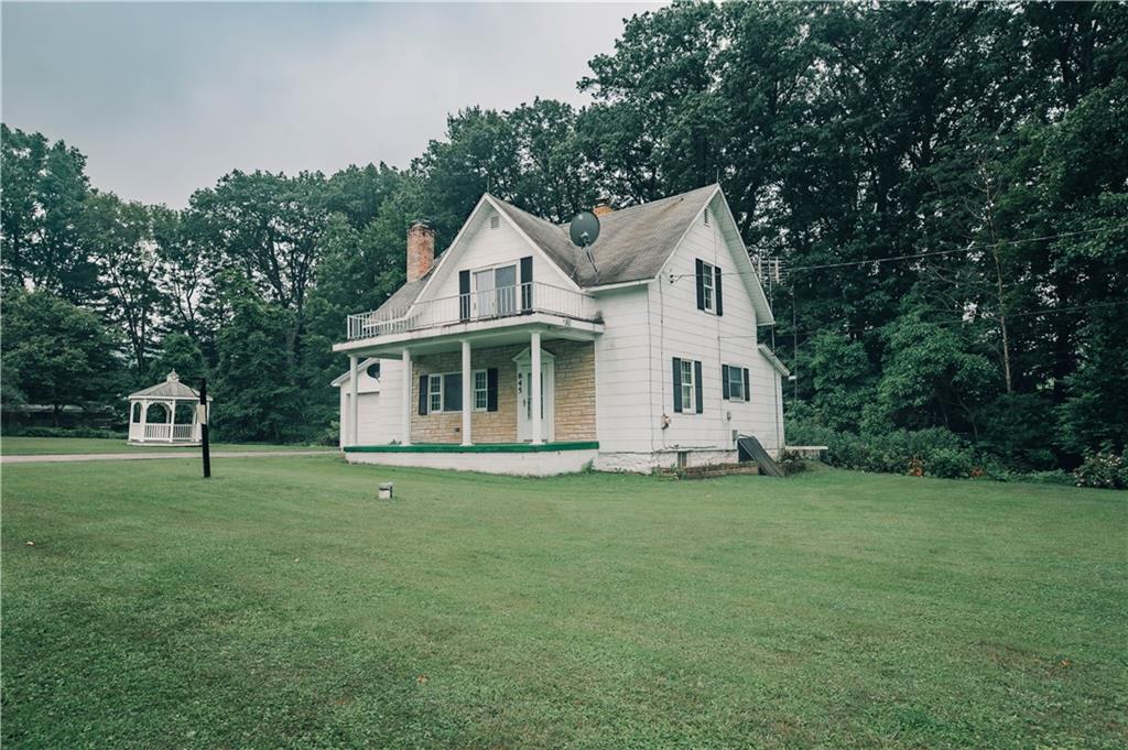 845 Grisemore Road Clymer, PA 15728 - Photo 4 of 21 a front view of a house with a garden