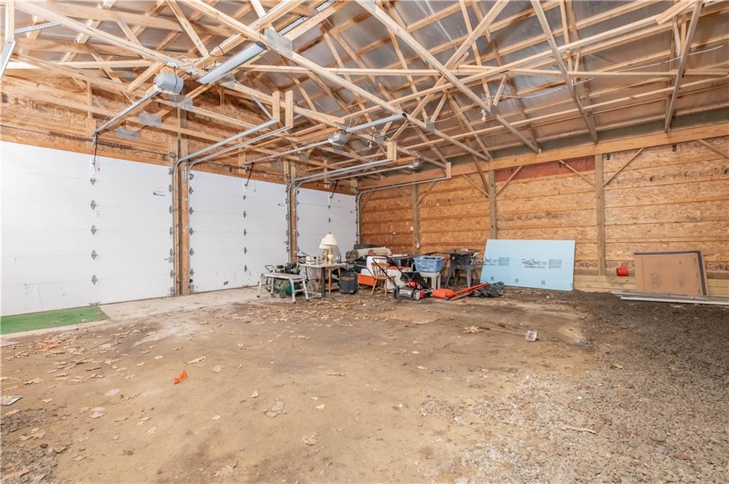 845 Grisemore Road Clymer, PA 15728 - Photo 6 of 21 a view of a empty room with storage