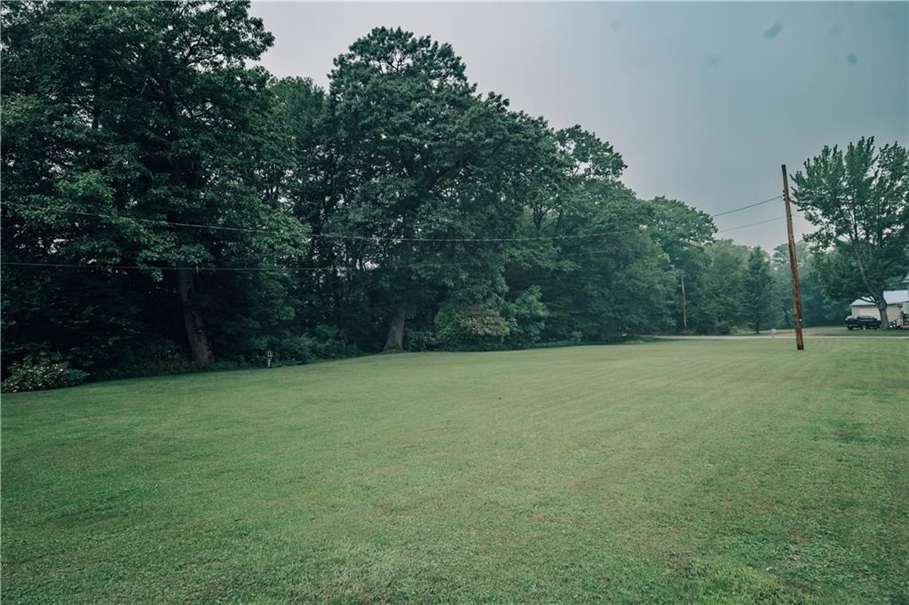 845 Grisemore Road Clymer, PA 15728 - Photo 7 of 21 a view of a field of grass and trees