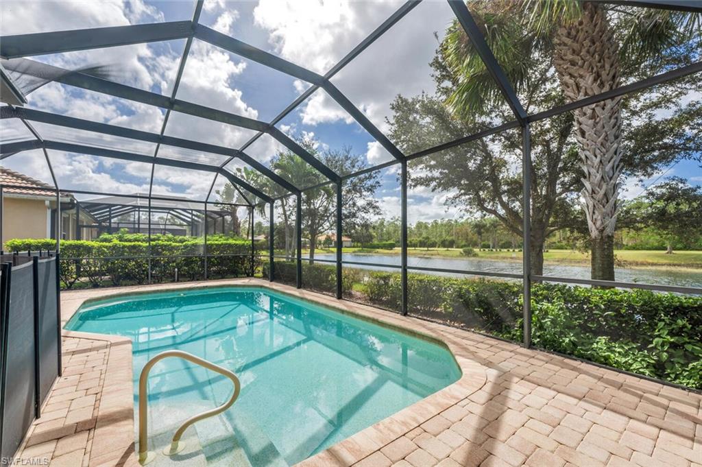 7975 Princeton Drive Naples, FL 34104 - Photo 2 of 28 a view of swimming pool