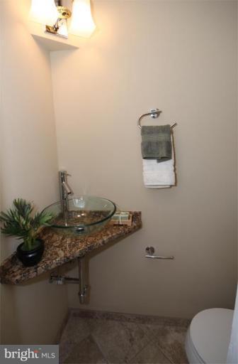 711 Kingsley Road Southwest Vienna, VA 22180 - Photo 14 of 20 Half Bath 1
