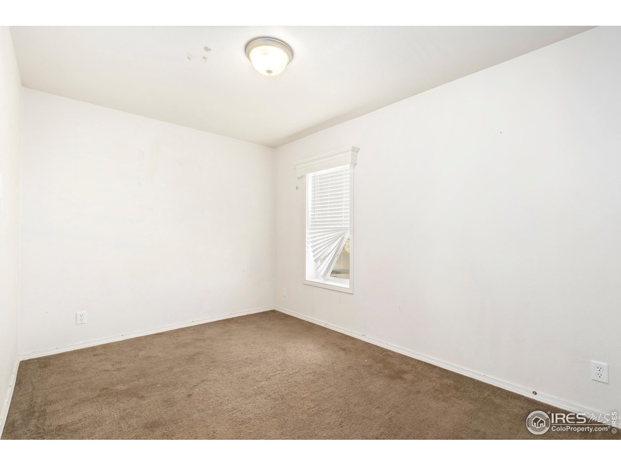 4324 Buffalo Trail Evans, CO 80620 - Photo 15 of 16 a view of an empty room