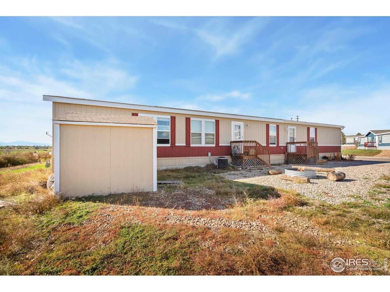4324 Buffalo Trail Evans, CO 80620 - Photo 2 of 16 a view of a house with a yard