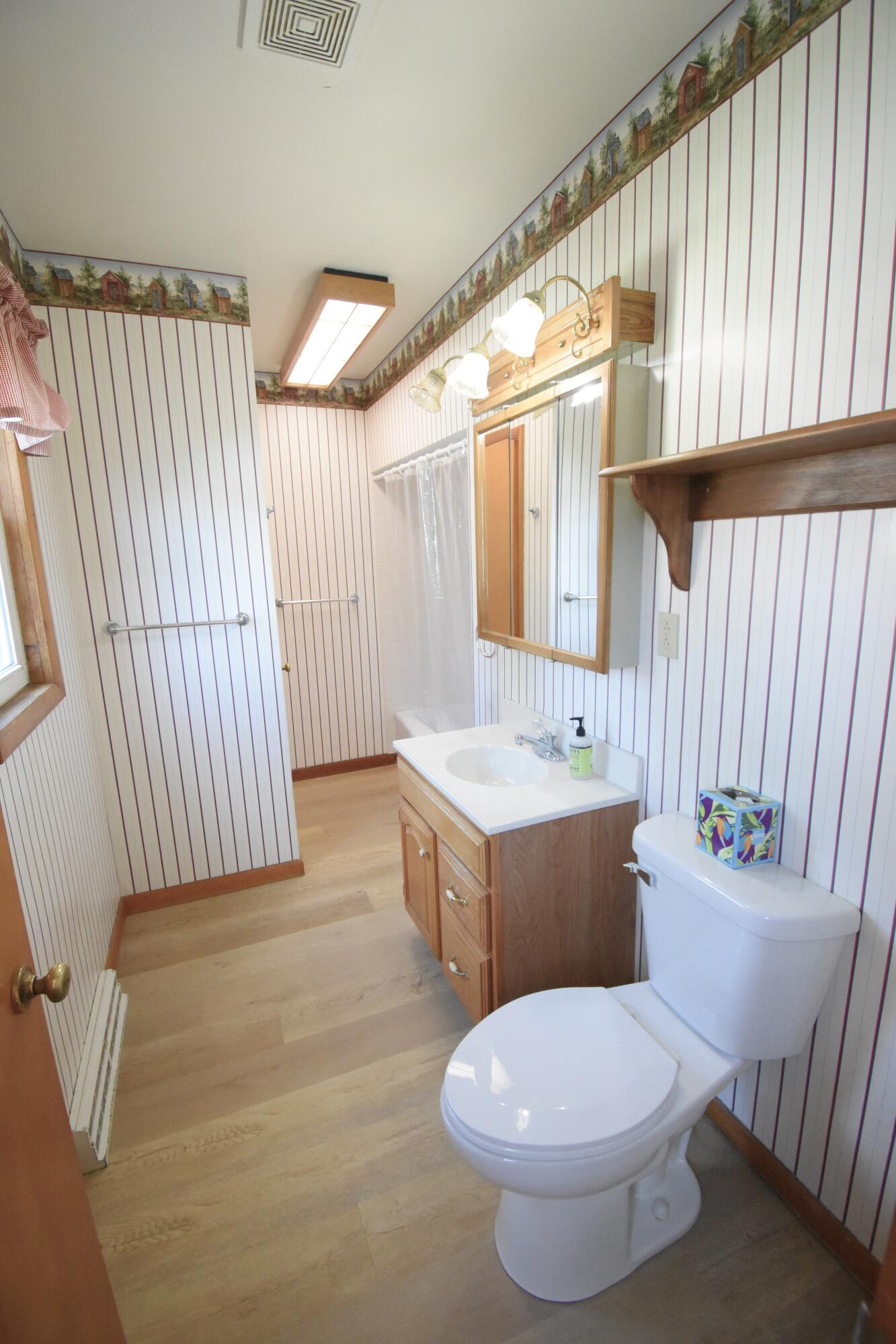 328 South Weston Street Rensselaer, IN 47978 - Photo 24 of 39 a bathroom with a sink toilet and shower